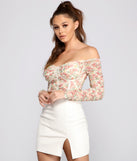 With fun and flirty details, A Ruched Romance Floral Crop Top shows off your unique style for a trendy outfit for the summer season!