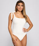 With fun and flirty details, Ribbed Tie Strap Bodysuit shows off your unique style for a trendy outfit for the summer season!