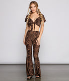 With fun and flirty details, Charming And Chic Snake Print Crop Top shows off your unique style for a trendy outfit for the summer season!