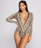 With fun and flirty details, Sleek and Stylish Snake Print Surplice Bodysuit shows off your unique style for a trendy outfit for the summer season!