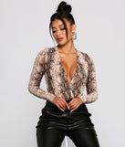 With fun and flirty details, Stylish Vixen Snake Print Bodysuit shows off your unique style for a trendy outfit for the summer season!