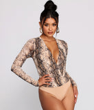 With fun and flirty details, Stylish Vixen Snake Print Bodysuit shows off your unique style for a trendy outfit for the summer season!