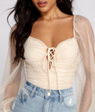 With fun and flirty details, Pretty and Poised Polka Dot Bodysuit shows off your unique style for a trendy outfit for the summer season!