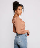 With fun and flirty details, Flirty Flair Ruffle Detail Crop Top shows off your unique style for a trendy outfit for the summer season!