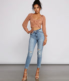 With fun and flirty details, Flirty Flair Ruffle Detail Crop Top shows off your unique style for a trendy outfit for the summer season!
