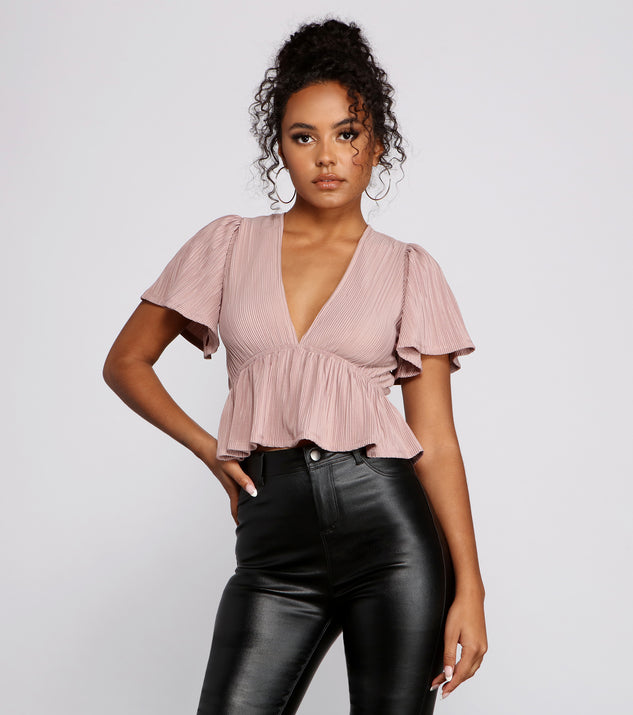 With fun and flirty details, Pleated and Poised Peplum Blouse shows off your unique style for a trendy outfit for the summer season!
