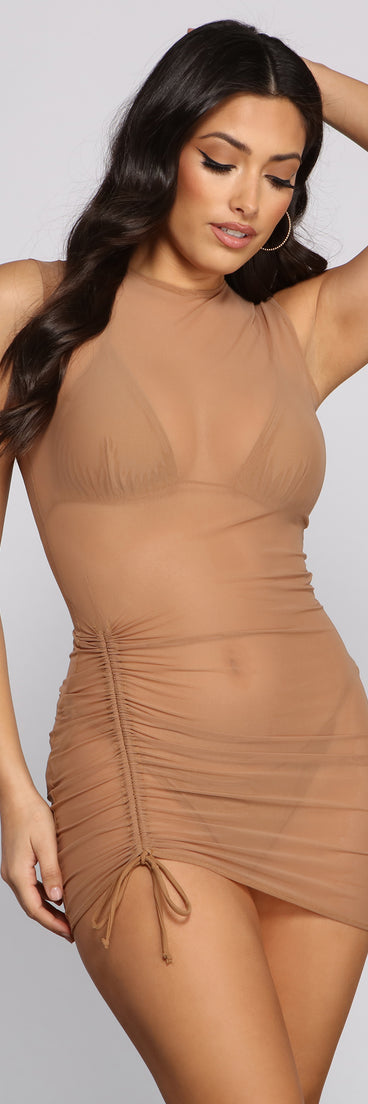 You’ll look stunning in the Drawn To You Mesh Cover Up when paired with its matching separate to create a glam clothing set perfect for parties, date nights, concert outfits, back-to-school attire, or for any summer event!