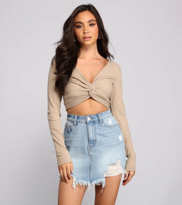 With fun and flirty details, Ribbed Knit Twist Front Crop Top shows off your unique style for a trendy outfit for the summer season!