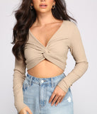 With fun and flirty details, Ribbed Knit Twist Front Crop Top shows off your unique style for a trendy outfit for the summer season!