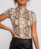 Dress up in Step Up Snake Print Bodysuit as your going-out dress for holiday parties, an outfit for NYE, party dress for a girls’ night out, or a going-out outfit for any seasonal event!