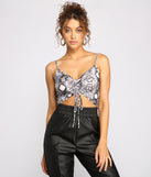 With fun and flirty details, Sassy Stunner Snake Print Crop Top shows off your unique style for a trendy outfit for the summer season!