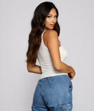 With fun and flirty details, Chic Cuts Knit Tank Top shows off your unique style for a trendy outfit for the summer season!