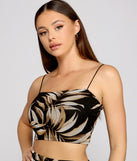 With fun and flirty details, Tropical Allure Mesh Crop Top shows off your unique style for a trendy outfit for the summer season!