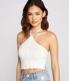 With fun and flirty details, Trendy Halter Knit Crop Top shows off your unique style for a trendy outfit for the summer season!