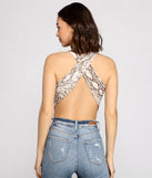 With fun and flirty details, Fierce Vixen Crepe Snake Print Bodysuit shows off your unique style for a trendy outfit for the summer season!