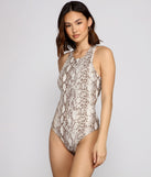 With fun and flirty details, Fierce Vixen Crepe Snake Print Bodysuit shows off your unique style for a trendy outfit for the summer season!