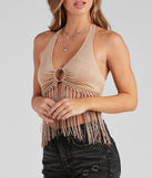 With fun and flirty details, the O-Ring Faux Suede Halter Top shows off your unique style for a trendy outfit for the spring or summer season!