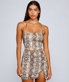 Dress up in Level Up Snake Crop Top as your going-out dress for holiday parties, an outfit for NYE, party dress for a girls’ night out, or a going-out outfit for any seasonal event!