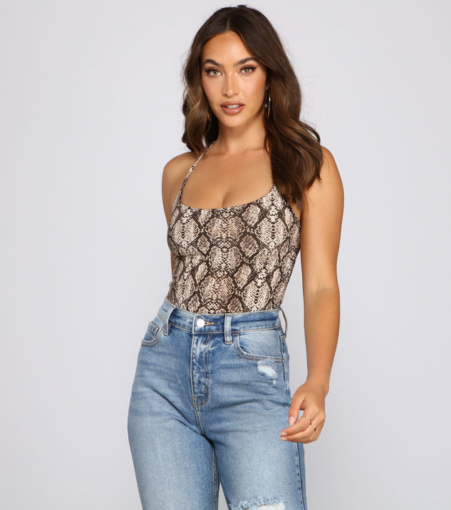 With fun and flirty details, Snake Print Vixen Lace-Up Bodysuit shows off your unique style for a trendy outfit for the summer season!