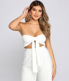 You’ll look stunning in the Whisked Away Tie Front Top when paired with its matching separate to create a glam clothing set perfect for parties, date nights, concert outfits, back-to-school attire, or for any summer event!