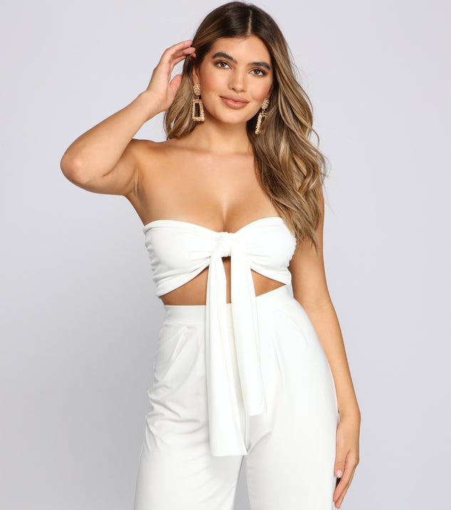You’ll look stunning in the Whisked Away Tie Front Top when paired with its matching separate to create a glam clothing set perfect for parties, date nights, concert outfits, back-to-school attire, or for any summer event!
