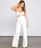 With fun and flirty details, Whisked Away Tie Front Top shows off your unique style for a trendy outfit for the summer season!