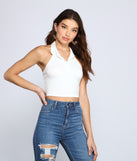 With fun and flirty details, Trendy Collared Halter Crop Top shows off your unique style for a trendy outfit for the summer season!