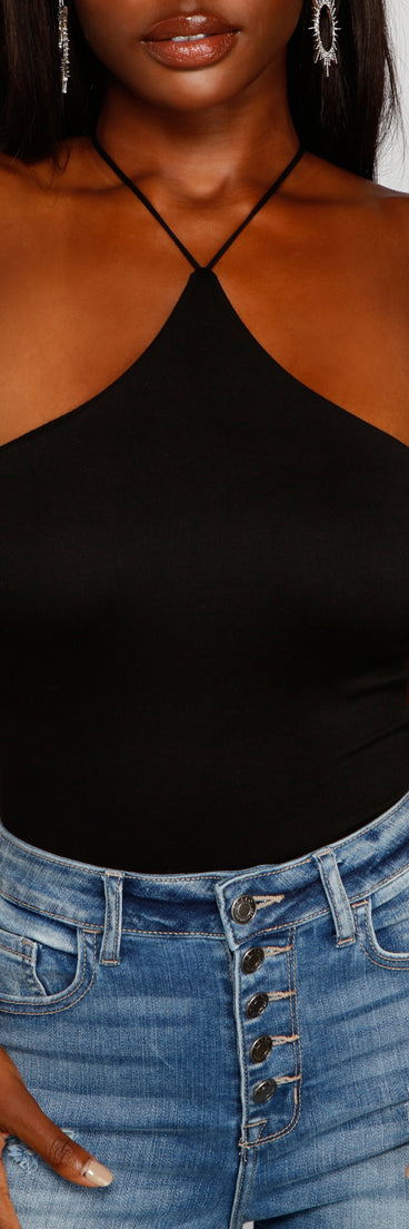 With fun and flirty details, Trendy Strappy Back Halter Bodysuit shows off your unique style for a trendy outfit for the summer season!