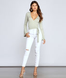 With fun and flirty details, Add Some Flair Wrap-Front Top shows off your unique style for a trendy outfit for the summer season!