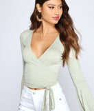 With fun and flirty details, Add Some Flair Wrap-Front Top shows off your unique style for a trendy outfit for the summer season!