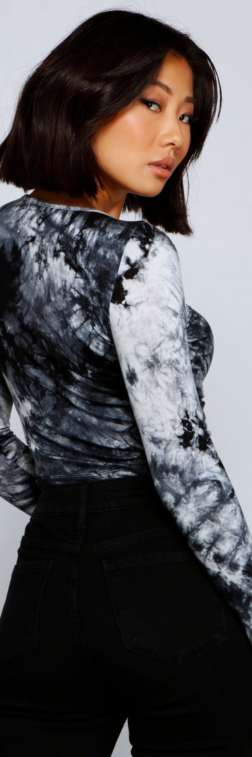 With fun and flirty details, Splash of Color Tie-Dye Crop Top shows off your unique style for a trendy outfit for the summer season!