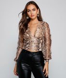 Alluring And Chic Snake Print Top creates the perfect New Year’s Eve Outfit or new years dress with stylish details in the latest trends to ring in 2023!