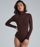 With fun and flirty details, Basic Long Sleeve Crepe Turtleneck Bodysuit shows off your unique style for a trendy outfit for the summer season!