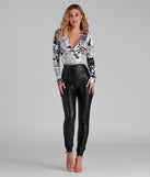 Extra Extra Newspaper Crop Top is a trendy pick to create 2023 festival outfits, festival dresses, outfits for concerts or raves, and complete your best party outfits!