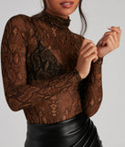 With fun and flirty details, Sexy Slither Mesh Turtleneck Top shows off your unique style for a trendy outfit for the summer season!
