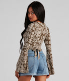 With fun and flirty details, Boho Bell Sleeve Wrap Top shows off your unique style for a trendy outfit for the summer season!