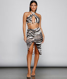 With fun and flirty details, Wild Thing Zebra Halter Top shows off your unique style for a trendy outfit for the summer season!