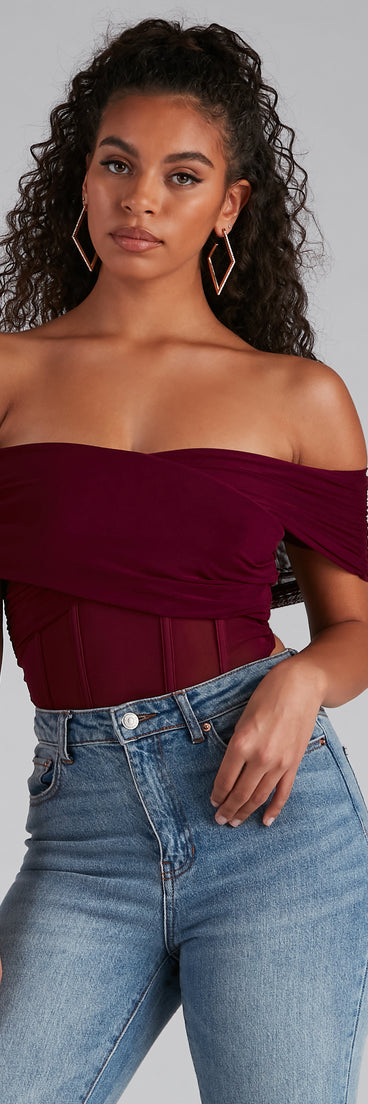 With fun and flirty details, New Crush Mesh Cross Bustier shows off your unique style for a trendy outfit for the summer season!