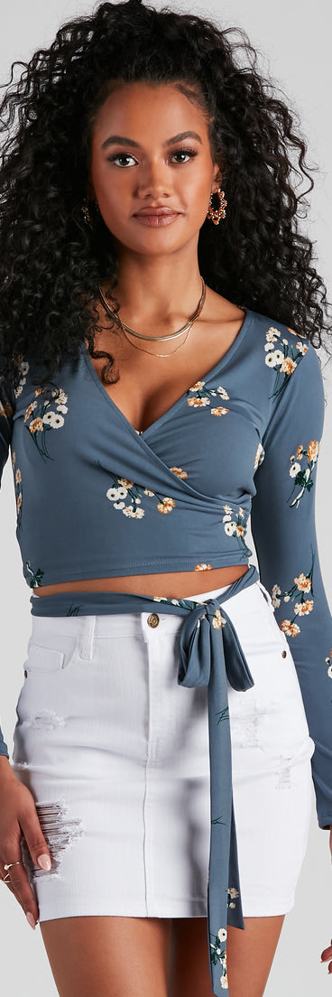 With fun and flirty details, Beauty Bloom Floral Tie Waist Top shows off your unique style for a trendy outfit for the summer season!