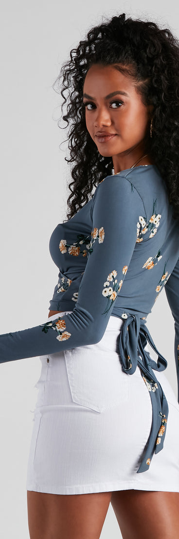 With fun and flirty details, Beauty Bloom Floral Tie Waist Top shows off your unique style for a trendy outfit for the summer season!