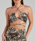 With fun and flirty details, Wild Season Zebra Halter Top shows off your unique style for a trendy outfit for the summer season!