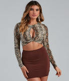 Dress up in Twist Of Fate Snake Print Crop Top as your going-out dress for holiday parties, an outfit for NYE, party dress for a girls’ night out, or a going-out outfit for any seasonal event!