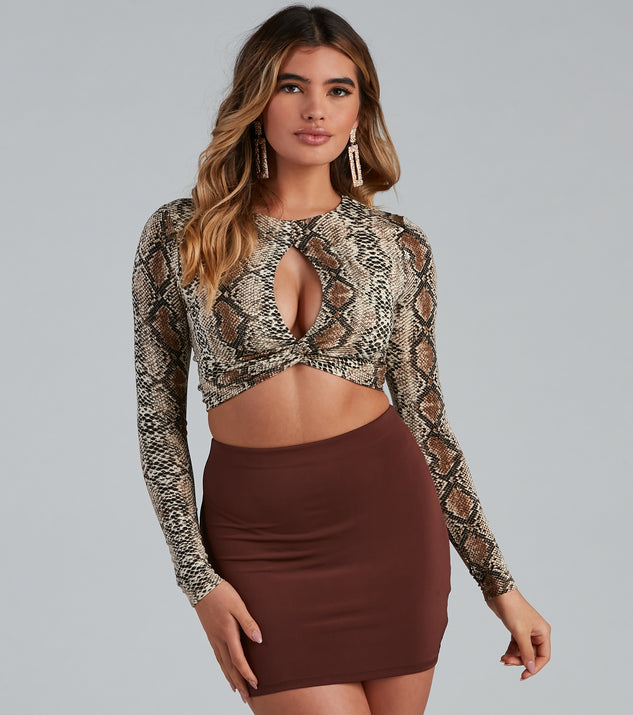 Dress up in Twist Of Fate Snake Print Crop Top as your going-out dress for holiday parties, an outfit for NYE, party dress for a girls’ night out, or a going-out outfit for any seasonal event!