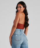 With fun and flirty details, Take The Plunge Faux Suede Bodysuit shows off your unique style for a trendy outfit for the summer season!