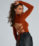 With fun and flirty details, Turn Heads Strappy Back Bodysuit shows off your unique style for a trendy outfit for the summer season!