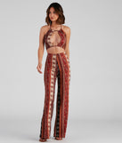 With fun and flirty details, Desert Dreamer Halter Crop Top shows off your unique style for a trendy outfit for the summer season!