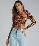 Bold Beauty Leopard Brushed Knit Halter Top creates the perfect New Year’s Eve Outfit or new years dress with stylish details in the latest trends to ring in 2023!