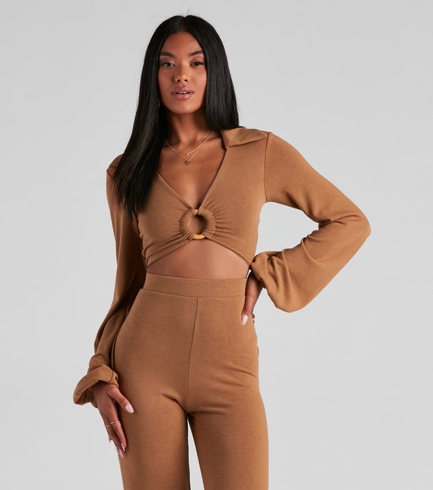 You’ll look stunning in the Cabana Long Sleeve O-Ring Crop Top when paired with its matching separate to create a glam clothing set perfect for a New Year’s Eve Party Outfit or Holiday Outfit for any event!
