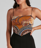 With fun and flirty details, Luxe Links Tie-Back Scarf Top shows off your unique style for a trendy outfit for the summer season!
