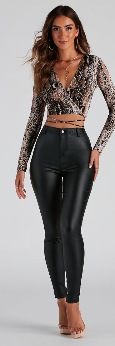 With fun and flirty details, Tie New Things Snake Wrap Top shows off your unique style for a trendy outfit for the summer season!